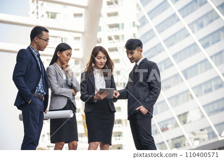 Diversity Business Partner meeting trust in teamwork and partnership businessman, businesswoman talking together in modern city. Asian coworker team meeting with Business People Working Together Team 110400571