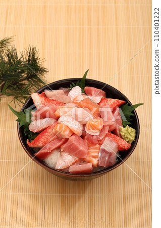Bowl of rice topped with sashimi Bowl of rice topped with sashimi 110401222