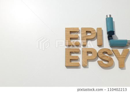 Epilepsy day written in wooden letters with inhalers 110402213