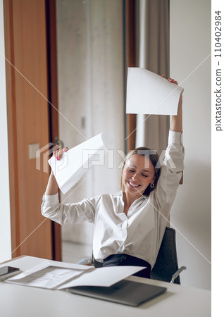 Young business woman looking happy and enjoyed Young business woman looking happy and enjoyed 110402984