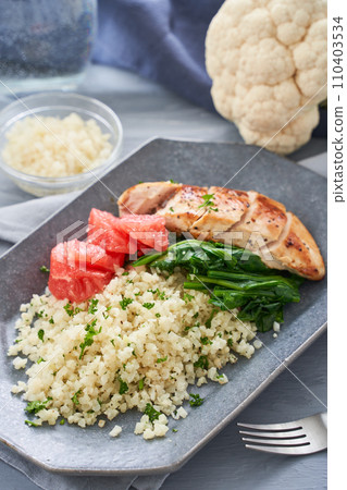 Low-carb plate of cauliflower rice and chicken breast Low-carb plate of cauliflower rice and chicken breast 110403534