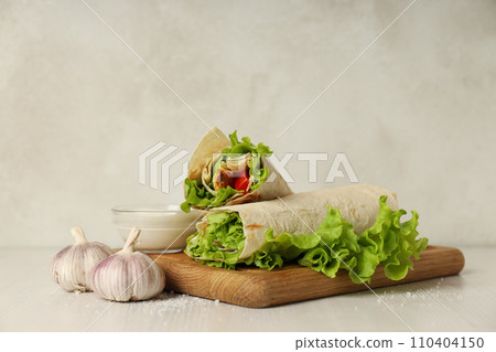 Tasty fast or homemade food concept - delicious shawarma Tasty fast or homemade food concept - delicious shawarma 110404150