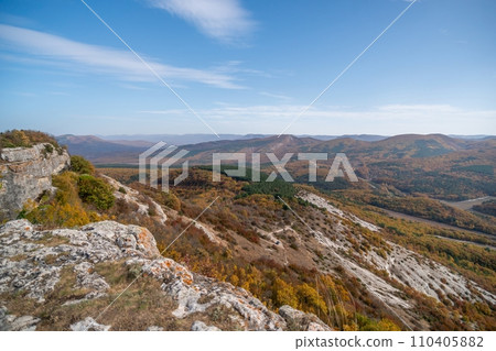 The autumn landscape of the mountain valley is an amazing, beautiful place at any time of the year. Hiking. Nature The autumn landscape of the mountain valley is an amazing, beautiful place at any time of the year. Hiking. Nature 110405882