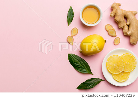 Natural cold and flu home remedies. Natural ingredients for immunity stimulation and viruses protection. top view flat lay Natural cold and flu home remedies. Natural ingredients for immunity stimulation and viruses protection. top view flat lay 110407229