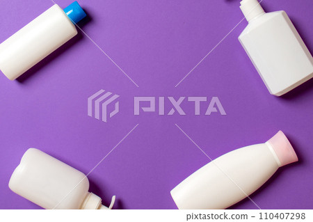Set of White Cosmetic containers isolated on colored background, top view with copy space. Group of plastic bodycare bottle containers with empty space for you design Set of White Cosmetic containers isolated on colored background, top view with copy space. Group of plastic bodycare bottle containers with empty space for you design 110407298