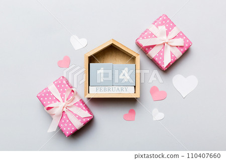 Valentine Day theme with wooden block calendar. Greeting card template for Valentines Day copy space for text Valentine Day theme with wooden block calendar. Greeting card template for Valentines Day copy space for text 110407660