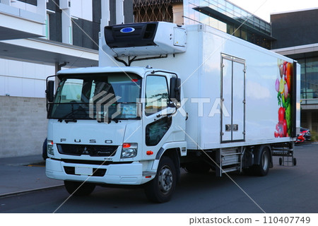 Japanese-made refrigerated truck (New Zealand) parked in front of the building Japanese-made refrigerated truck (New Zealand) parked in front of the building 110407749