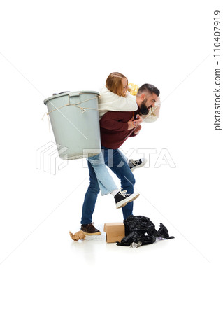 Young man and woman taking care environmental cleaning, taking garbage away isolated over white background 110407919