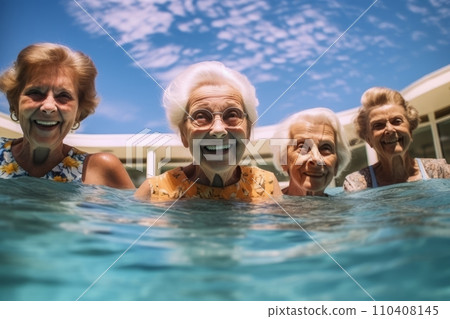Active senior women swimming in the pool Active senior women swimming in the pool 110408145