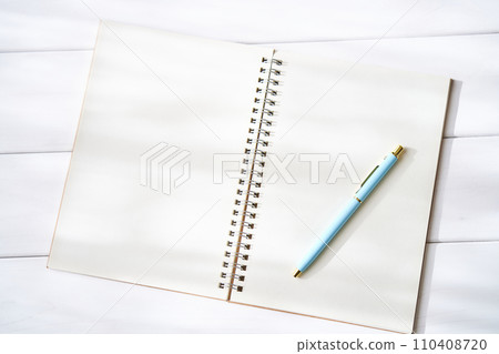 Open plain ring notebook and ballpoint pen Open plain ring notebook and ballpoint pen 110408720