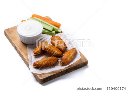 Buffalo spicy chicken wings with cayenne pepper sauce isolated on white background 110409174