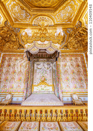 Bedchamber of the King. Decorated interior with historical furniture and architectural details of Chateau Versailles near Paris, France Bedchamber of the King. Decorated interior with historical furniture and architectural details of Chateau Versailles near Paris, France 110409548