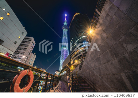 "Tokyo" Night view of the illuminated Tokyo Skytree from the Oshinari Park pier 110409637