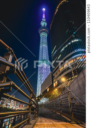 "Tokyo" Night view of the illuminated Tokyo Skytree from the Oshinari Park pier 110409643