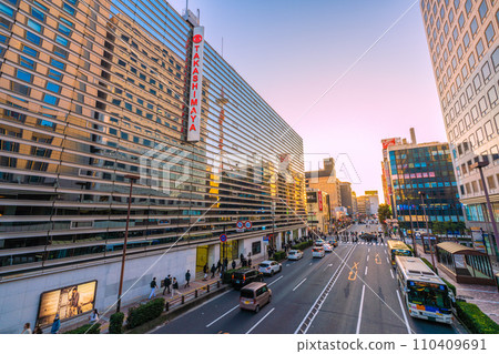 Yokohama cityscape in Japan January. View of the sunset and Yokohama Takashimaya from in front of Yokohama Station = January 6, 2020 Yokohama cityscape in Japan January. View of the sunset and Yokohama Takashimaya from in front of Yokohama Station = January 6, 2020 110409691