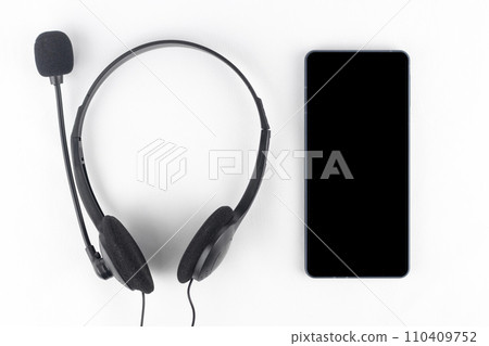 Smartphone and black headphones (white background, wired) 110409752