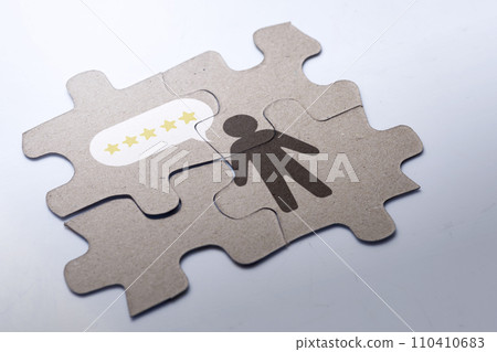 Jigsaw puzzle with the human figure and five-star rating Jigsaw puzzle with the human figure and five-star rating 110410683