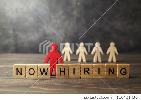 Wooden figure and wooden cubes with Now Hiring letters Wooden figure and wooden cubes with Now Hiring letters 110411436