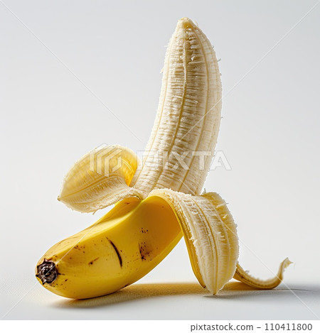 Half peeled ripe banana, isolated on white background 110411800