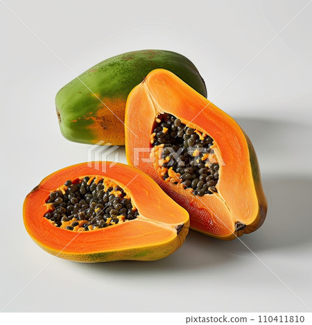 whole and half of ripe papaya isolated on white background whole and half of ripe papaya isolated on white background 110411810