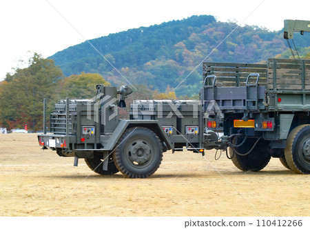 Ground Self-Defense Force outdoor cooker No. 1 being towed 110412266