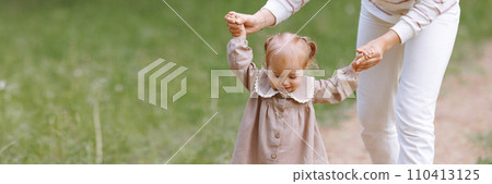 Banner woman in white clothes have fun with cute child baby girl 1-2 year old Banner woman in white clothes have fun with cute child baby girl 1-2 year old 110413125