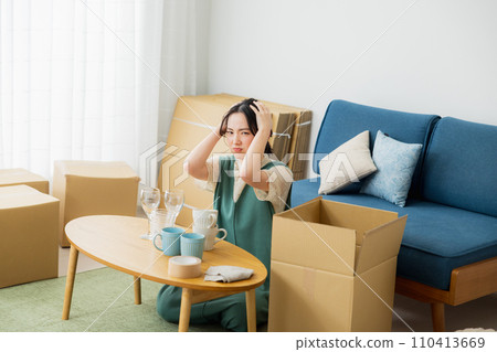 A woman preparing to move 110413669