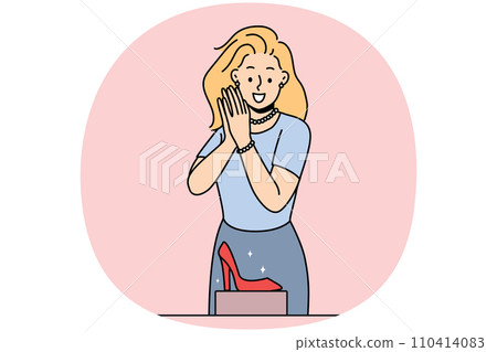 Smiling woman buying shoes in boutique 110414083