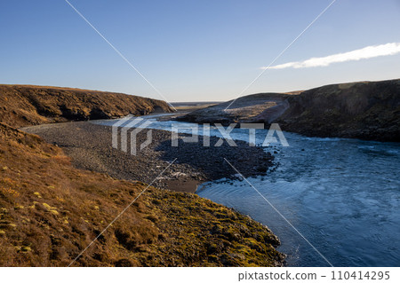 River and an autumn country, south Iceland 110414295