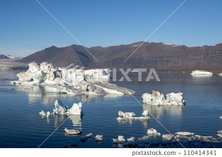 Floating pieces of glacier, Jokulsarlon, Iceland Floating pieces of glacier, Jokulsarlon, Iceland 110414341