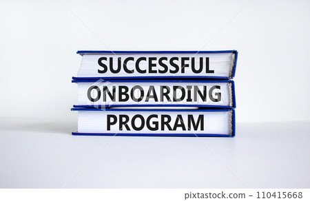 Successful onboarding program symbol. Books with words 'Successful onboarding program' on beautiful white background. Business and Successful onboarding program concept. Copy space. 110415668