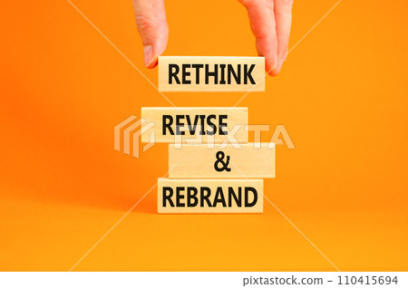 Rethink revise rebrand symbol. Concept word Rethink Revise and Rebrand on beautiful block. Beautiful orange background. Business brand motivational rethink revise rebrand concept. Copy space. Rethink revise rebrand symbol. Concept word Rethink Revise and Rebrand on beautiful block. Beautiful orange background. Business brand motivational rethink revise rebrand concept. Copy space. 110415694