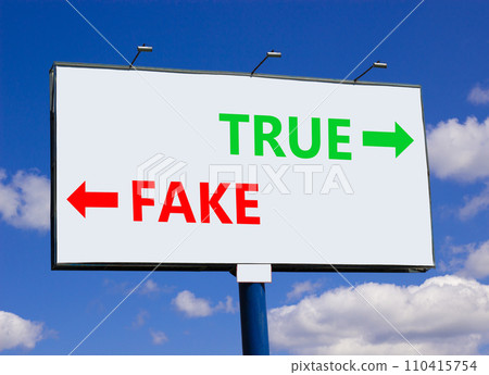 True or fake symbol. Concept word True or Fake on beautiful billboard with two arrows. Beautiful blue sky with clouds background. Business and true or fake concept. Copy space. 110415754