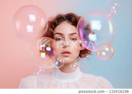 Beautiful young woman surrounded by soap bubbles. Concept of dreaming, thinking, worries and problems, lightheartedness. Mental health, psychology, inner world, shyness, alone 110416296