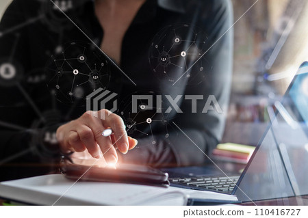 Businesswoman working in the global business network. 110416727