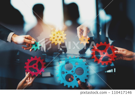 Business team work together and combine pieces of gears. Partnership and integration concept 110417146