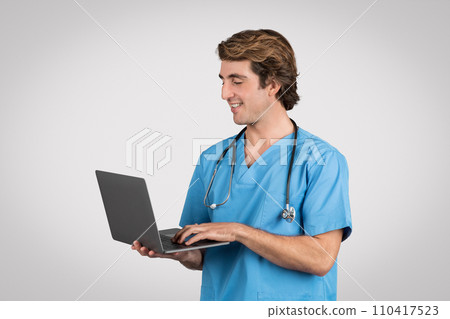 Smiling male nurse with laptop, modern healthcare Smiling male nurse with laptop, modern healthcare 110417523