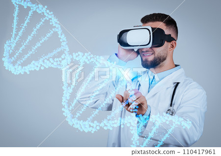 Expert young male doctor in VR headset explores vibrant virtual DNA strand with CRISPR precision 110417961