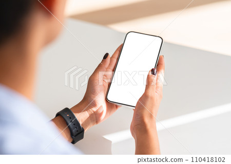 Lady latin millennial manager use phone with empty screen, show modern device 110418102