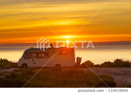 Caravan on sea at sunrise. Caravan on sea at sunrise. 110419094