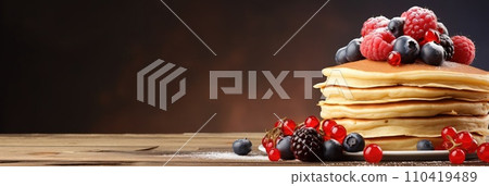 Stack of pancakes with berries. Advertising banner, web banner. Lush delicious pancakes with blueberries, raspberries and syrup for homemade breakfast. Lifestyle concept of food, cooking. Copy space. Stack of pancakes with berries. Advertising banner, web banner. Lush delicious pancakes with blueberries, raspberries and syrup for homemade breakfast. Lifestyle concept of food, cooking. Copy space. 110419489