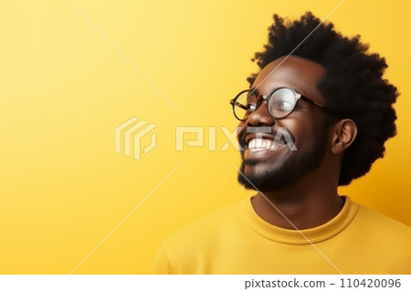 Handsome african american man wearing glasses on yellow background. Handsome african american man wearing glasses on yellow background. 110420096