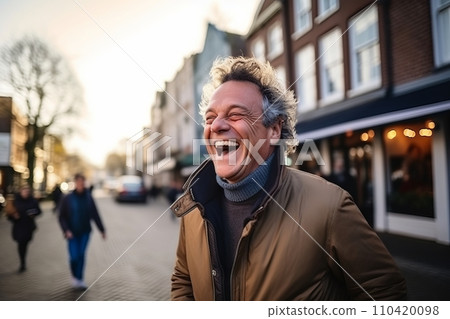 Portrait of a middle-aged man laughing in the city Portrait of a middle-aged man laughing in the city 110420098