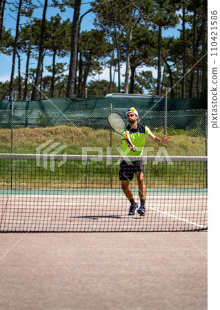 Tennis player performing a drop shot Tennis player performing a drop shot 110421586