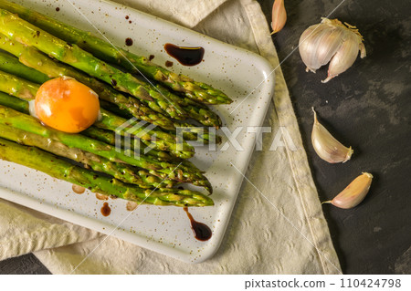 Asparagus cooked with egg Asparagus cooked with egg 110424798