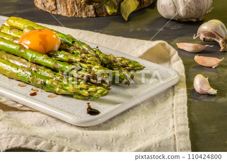 Asparagus cooked with egg Asparagus cooked with egg 110424800
