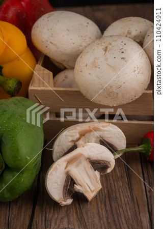 Vegetables on wooden box 110424911