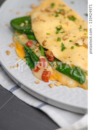 Omelet with vegetables 110424971