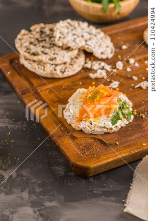 Smoked salmon on rice bread toasts 110424994