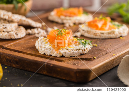 Smoked salmon on rice bread toasts Smoked salmon on rice bread toasts 110425000